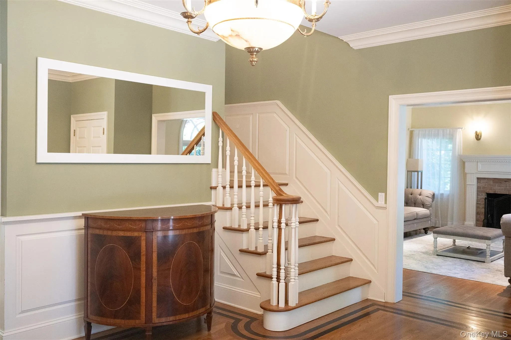 Entry Foyer with custom inlay hardwood flooring and a generous size. Entry Foyer with custom inlay hardwood flooring and a generous size.