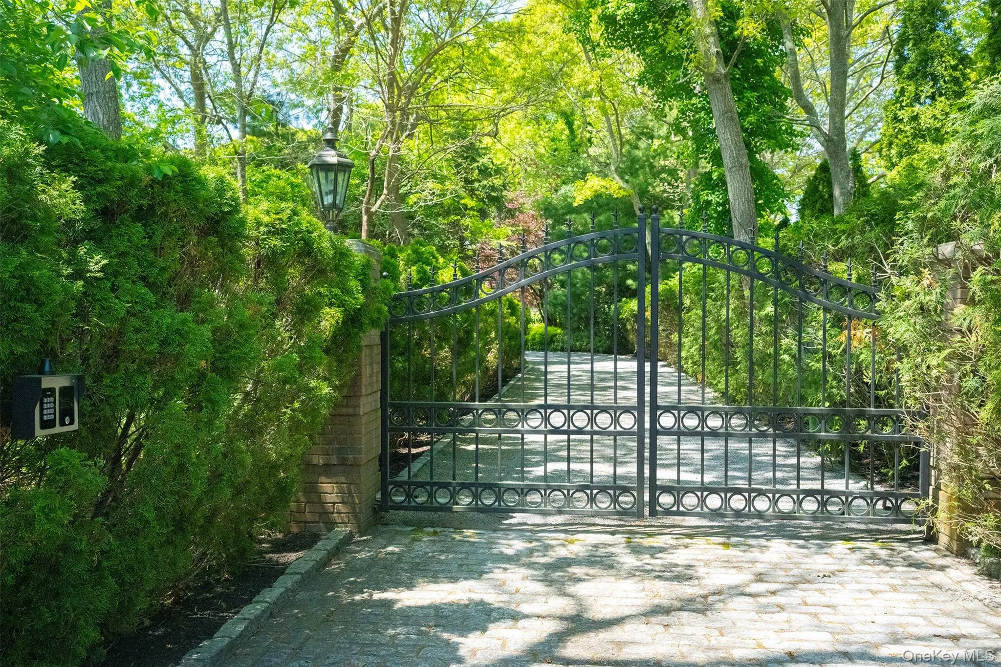 Double gate entry with full property line fencing and mature privacy landscaping from all adjoining properties. Double gate entry with full property line fencing and mature privacy landscaping from all adjoining properties.