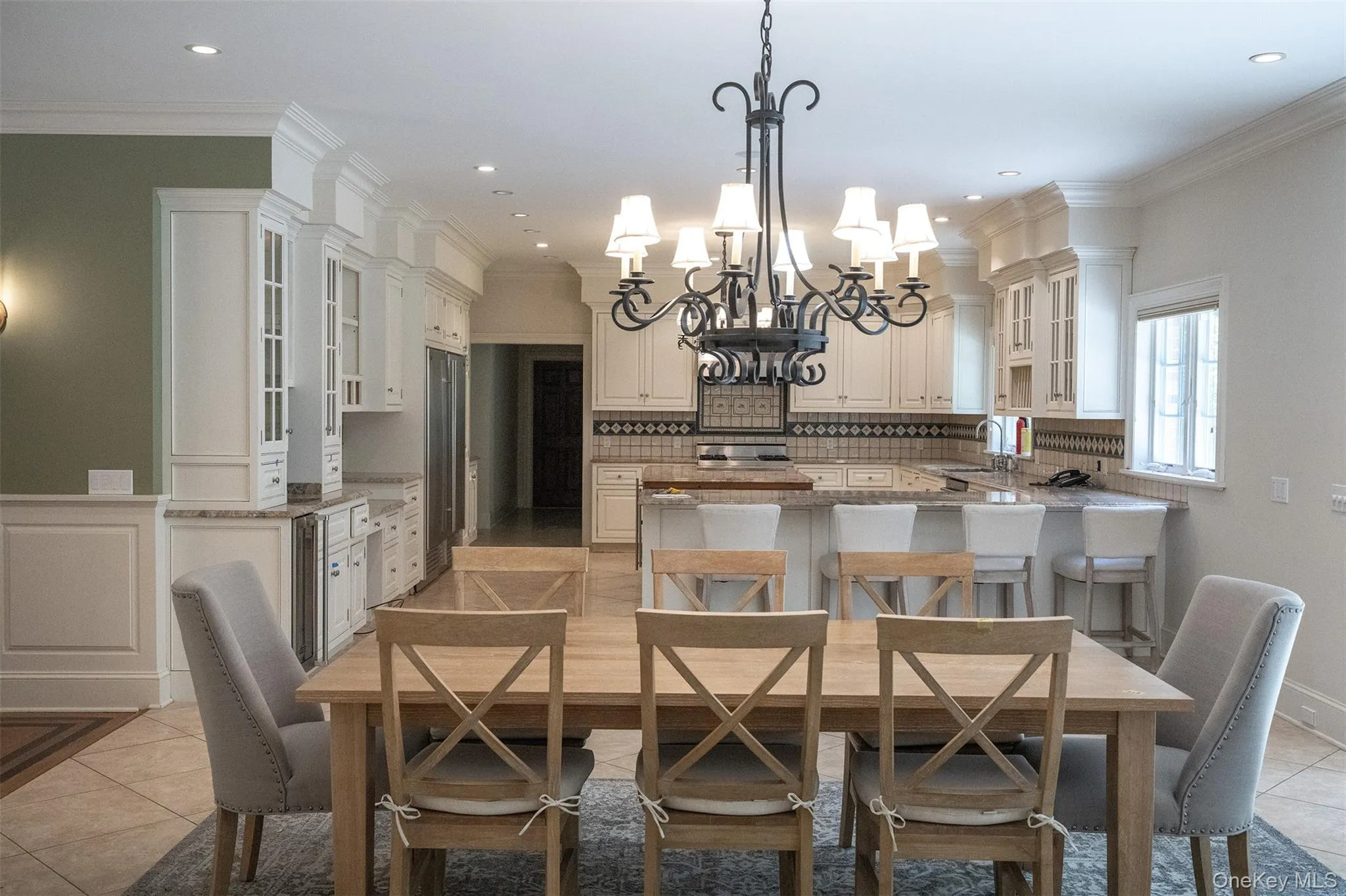 Don't let the photo deceive you. This is an expansive custom kitchen with Sub Zero built in freezer and refrigerator. Don't let the photo deceive you. This is an expansive custom kitchen with Sub Zero built in freezer and refrigerator.