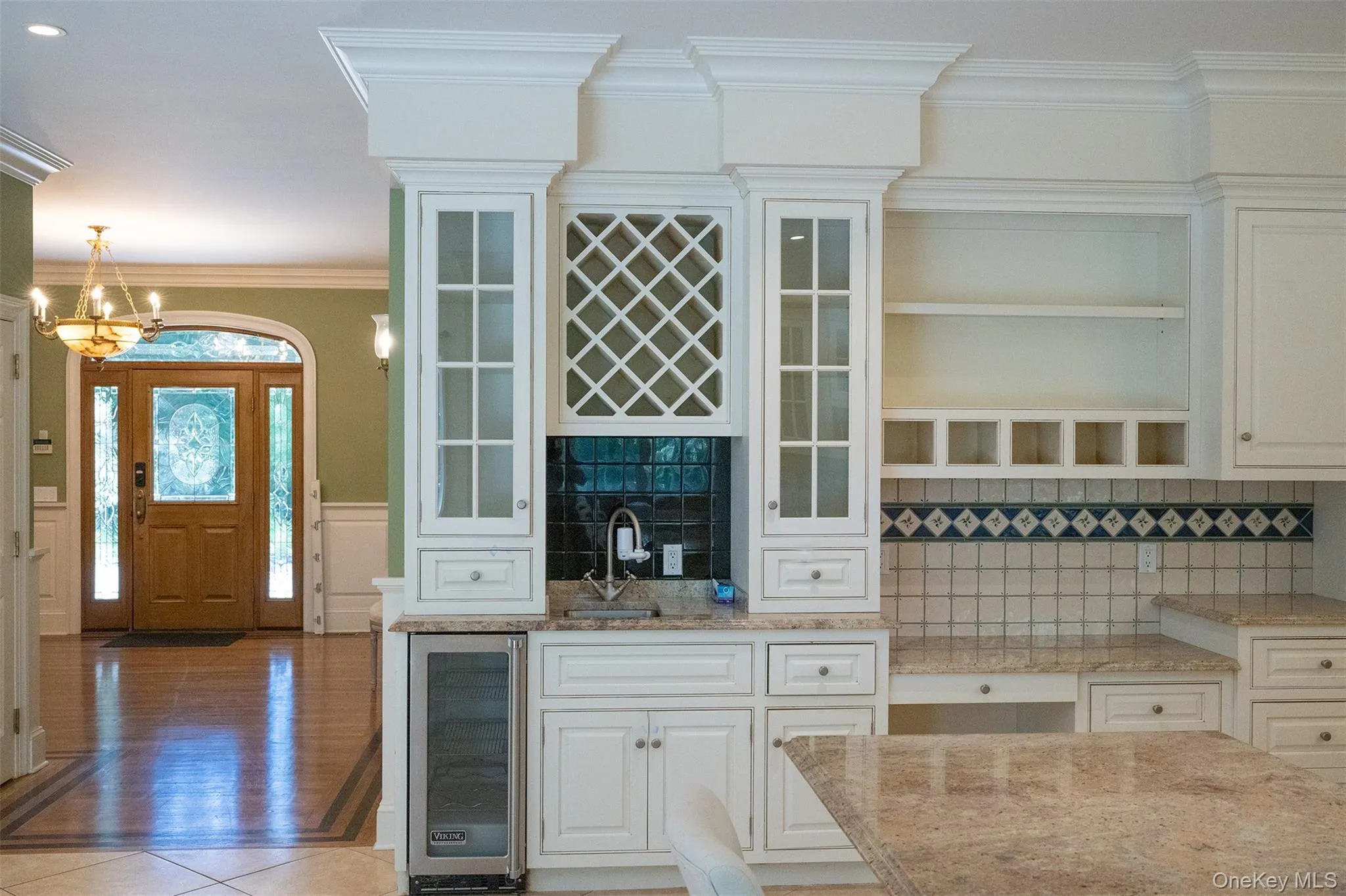 Custom millwork is seen throughout the property. Not just the kitchen cabinetry. Custom millwork is seen throughout the property. Not just the kitchen cabinetry.