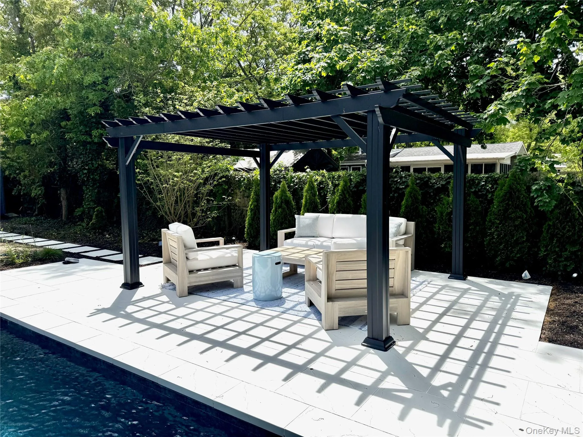 View of patio featuring a pergola and an outdoor living space View of patio featuring a pergola and an outdoor living space