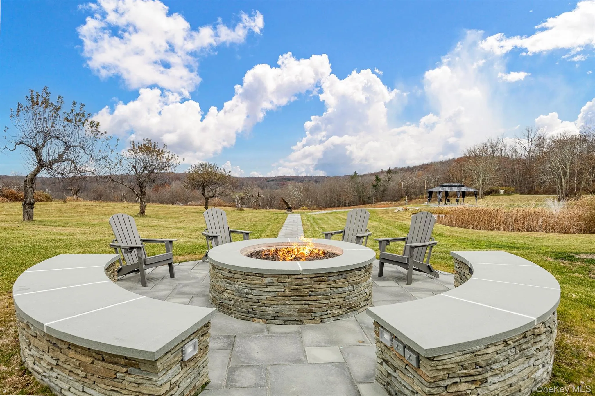 Gas fire pit with beautiful stone work Gas fire pit with beautiful stone work