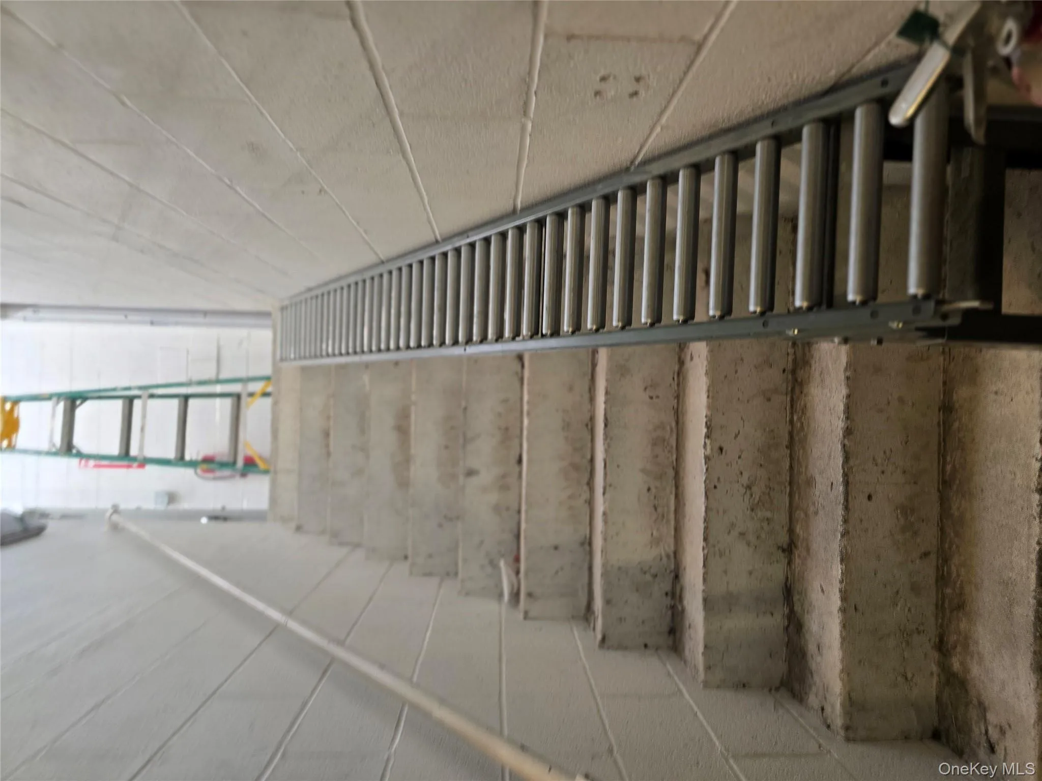 Stairs featuring concrete block wall Stairs featuring concrete block wall