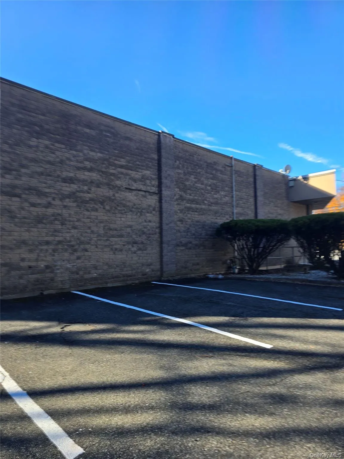 View of uncovered parking lot View of uncovered parking lot