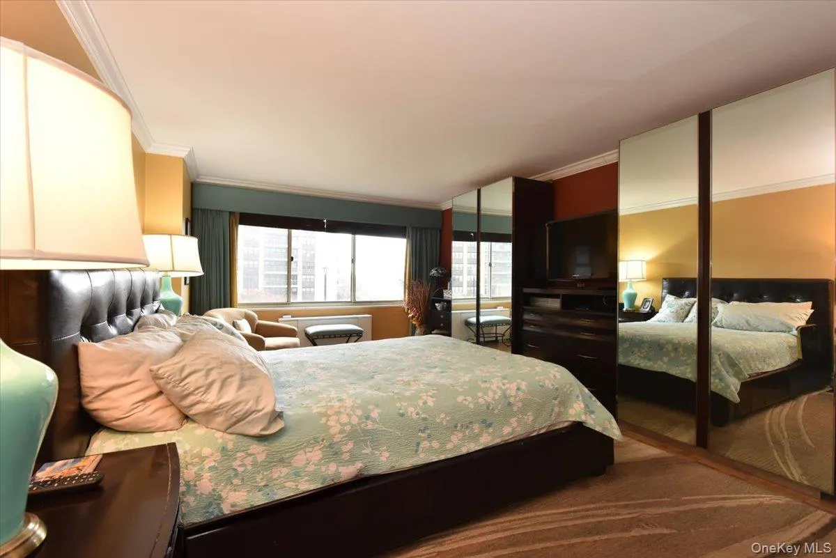 Bedroom with ornamental molding Bedroom with ornamental molding