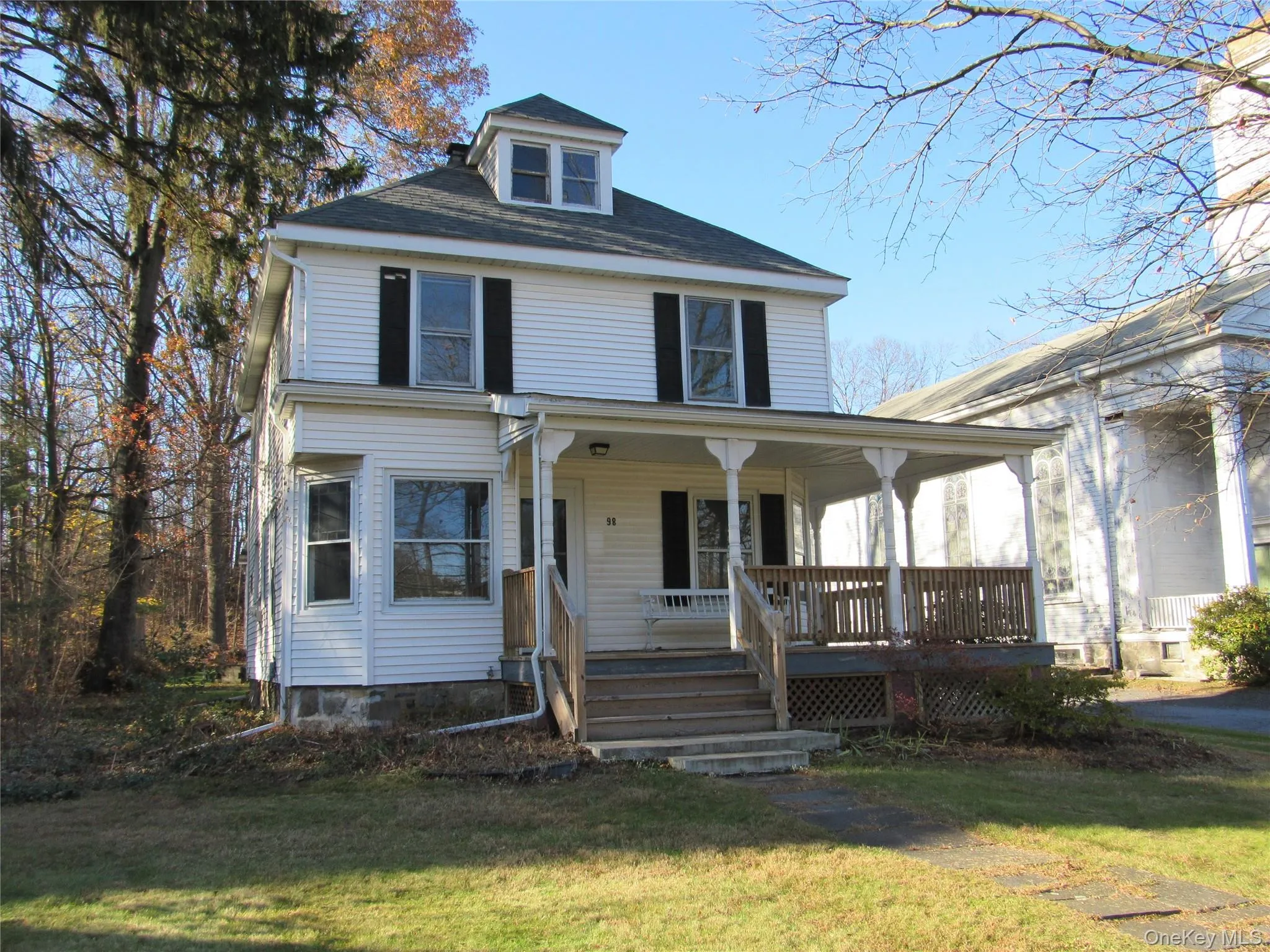 View of front of house featuring a porch and a front lawn View of front of house featuring a porch and a front lawn