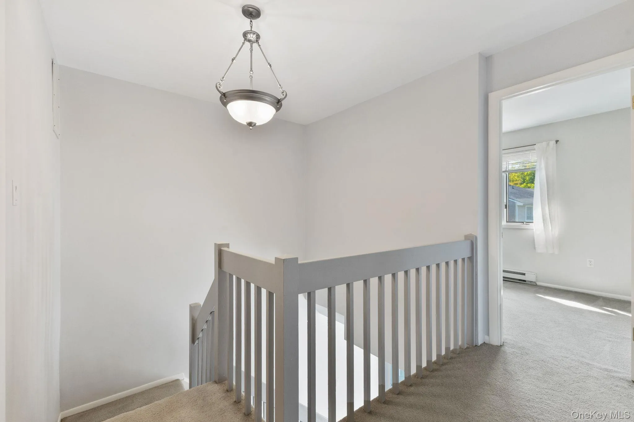 Upstairs landing with access to all bedrooms, full hall bath, and a versatile office/den, living like a three-bedroom home with a primary en-suite and fully updated bathrooms. Upstairs landing with access to all bedrooms, full hall bath, and a versatile office/den, living like a three-bedroom home with a primary en-suite and fully updated bathrooms.