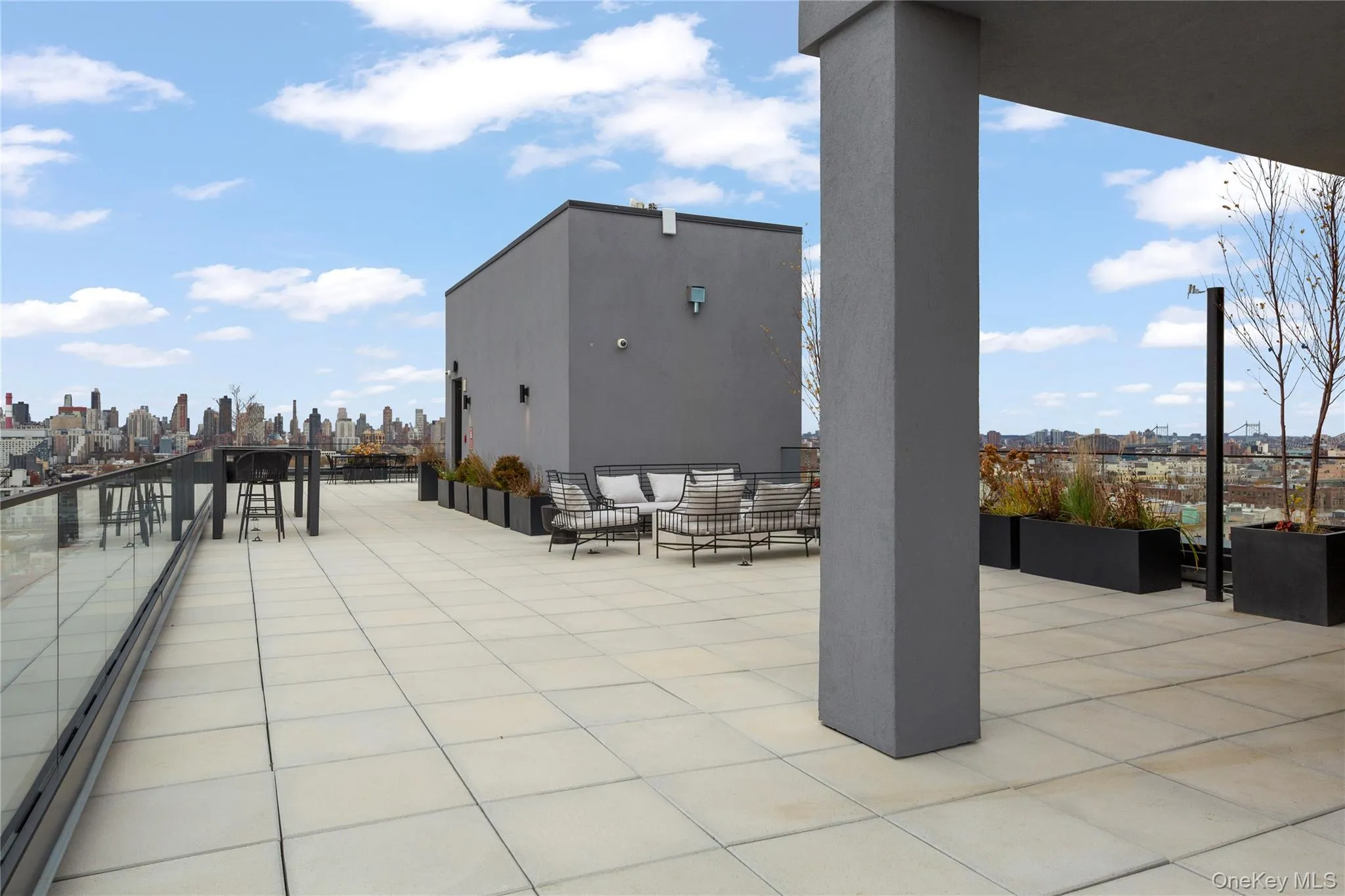 View of patio / terrace featuring a view of skyline and outdoor lounge area View of patio / terrace featuring a view of skyline and outdoor lounge area