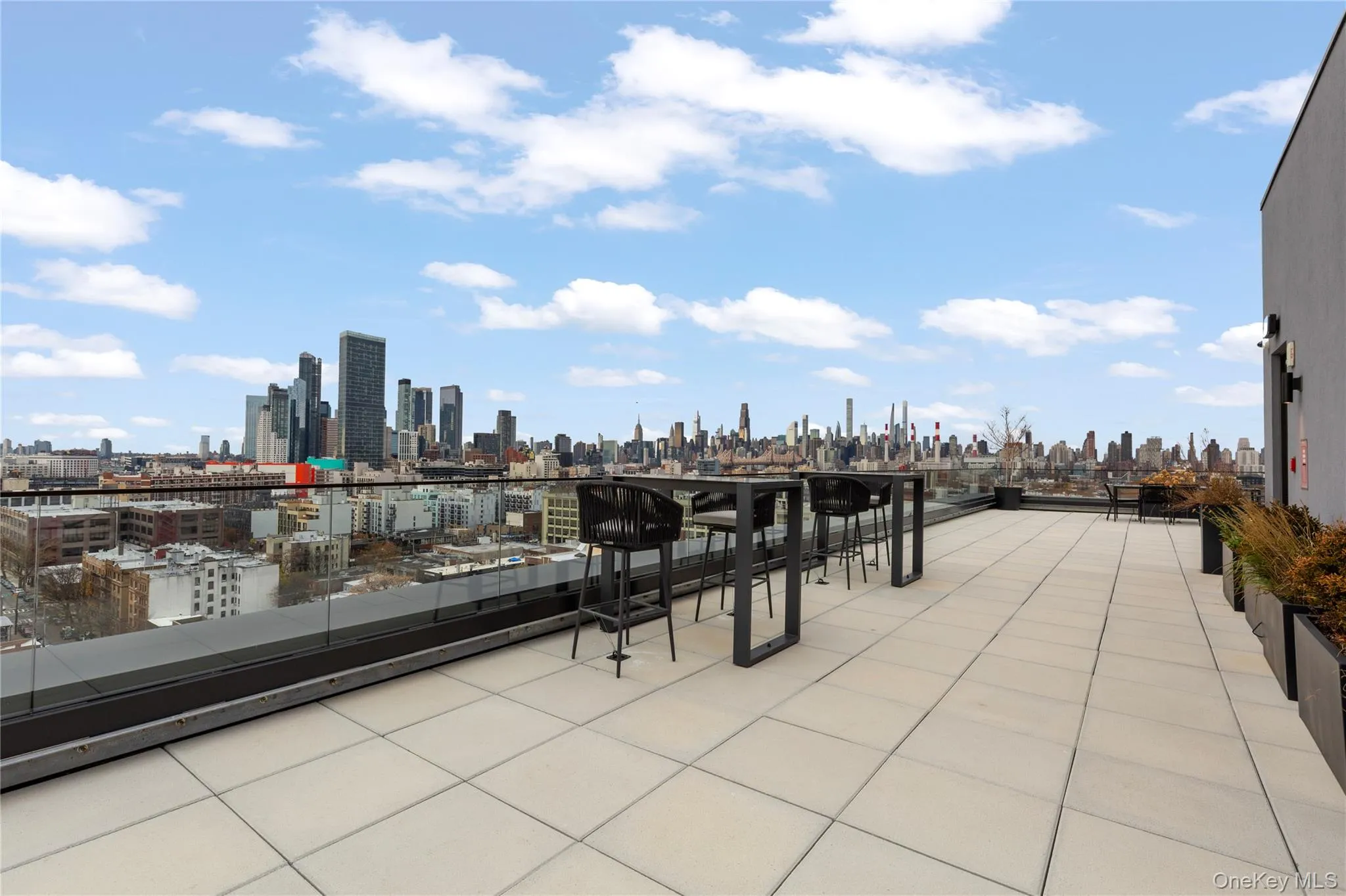 View of patio featuring a skyline view View of patio featuring a skyline view