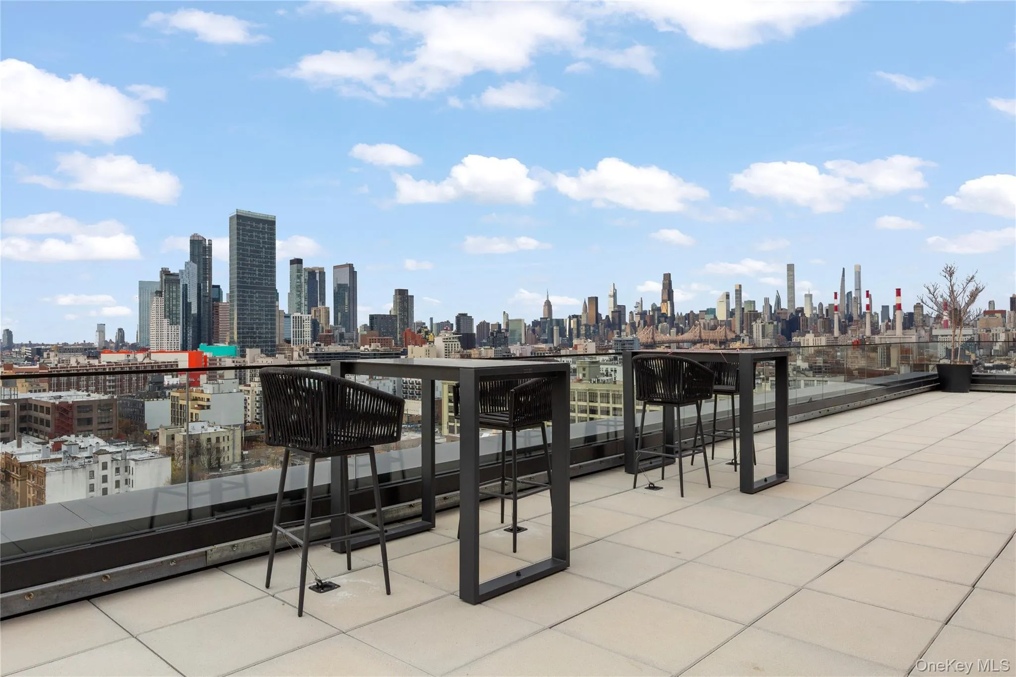 View of patio / terrace featuring a skyline view View of patio / terrace featuring a skyline view