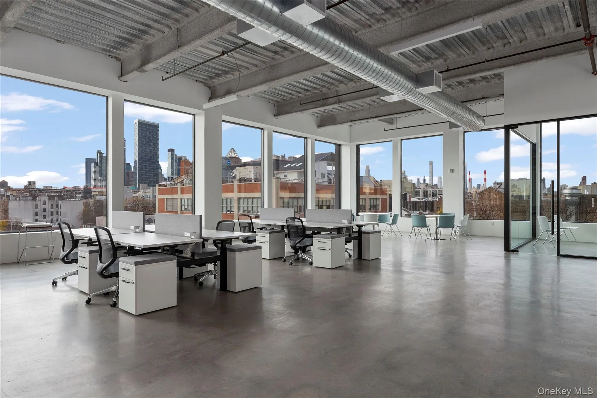 Sunroom / solarium featuring a skyline view Sunroom / solarium featuring a skyline view