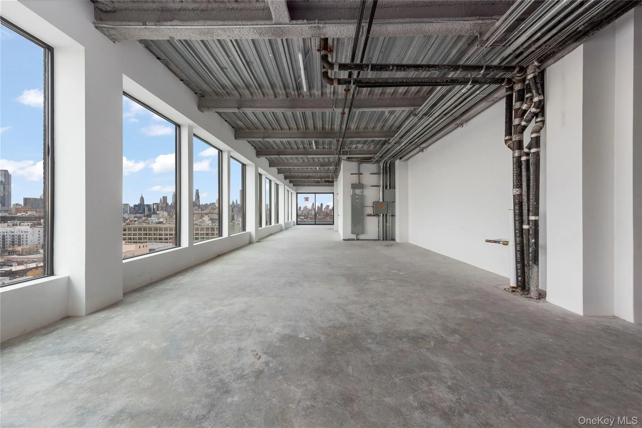 Garage featuring a skyline view Garage featuring a skyline view