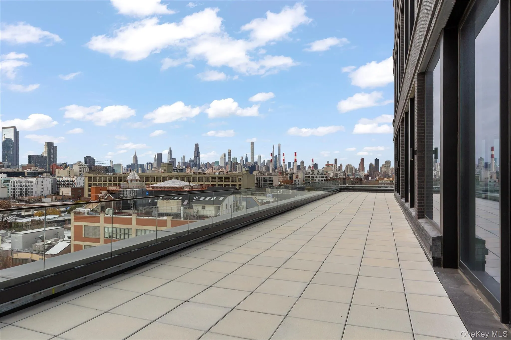 Balcony featuring a skyline view Balcony featuring a skyline view