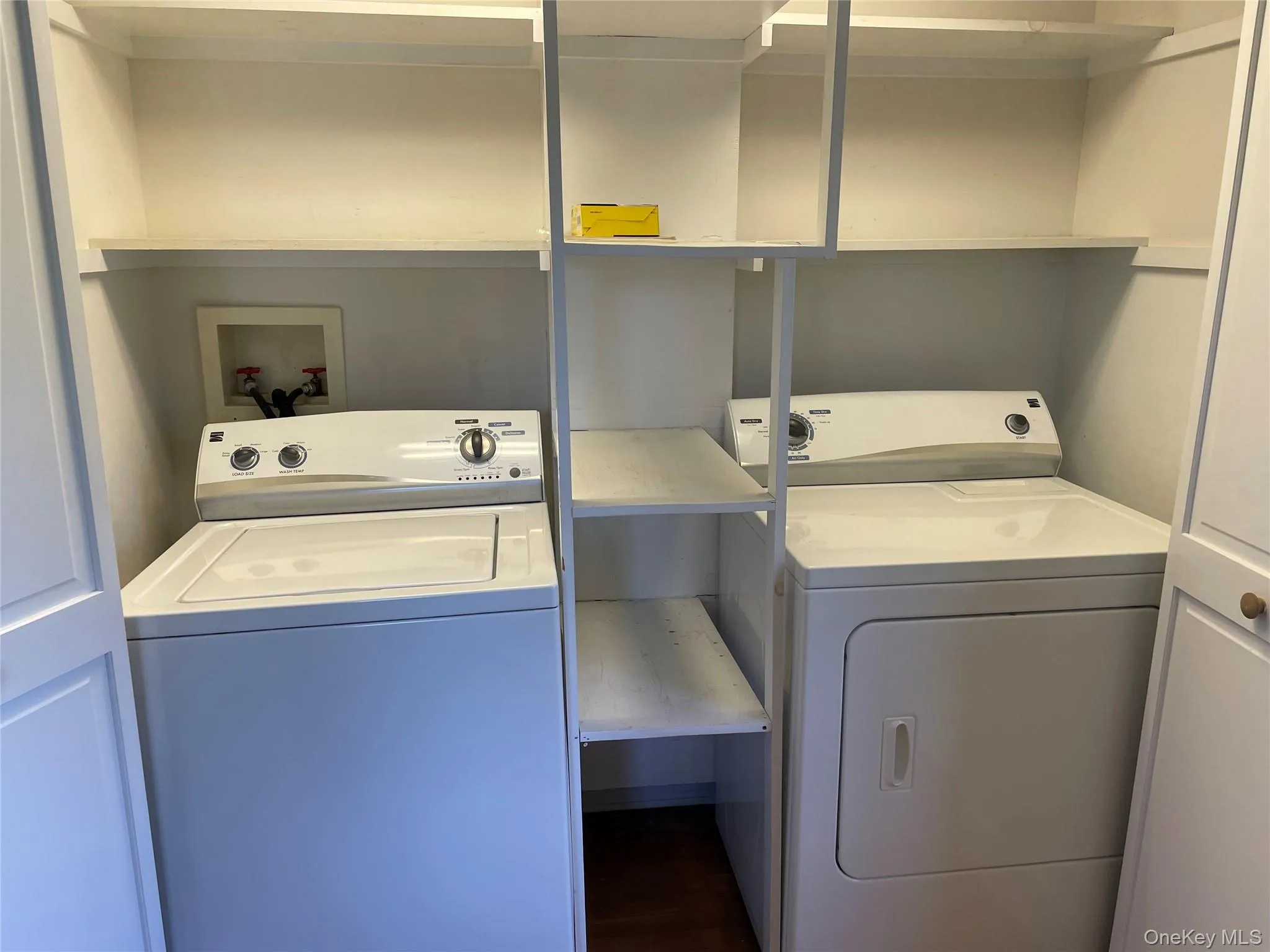 Laundry room featuring washer and clothes dryer Laundry room featuring washer and clothes dryer