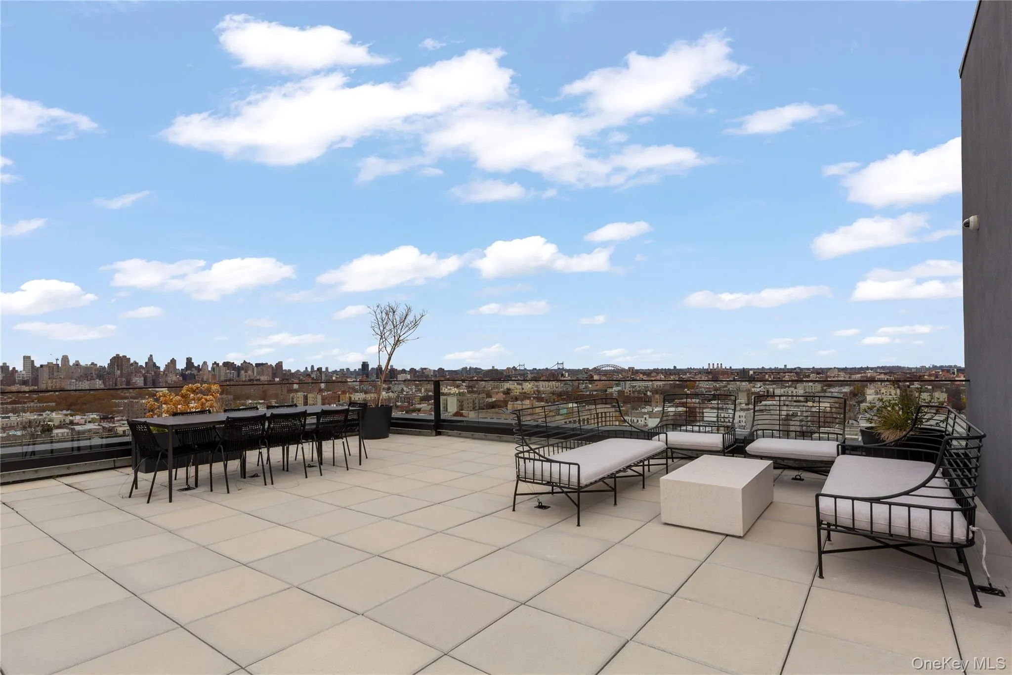 View of patio / terrace featuring a skyline view View of patio / terrace featuring a skyline view