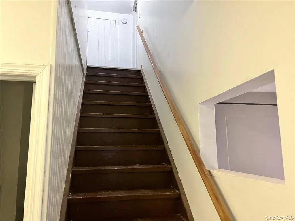 Stairs to bedrooms and another bathroom Stairs to bedrooms and another bathroom