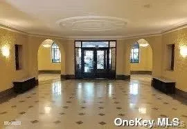 Lobby featuring crown molding Lobby featuring crown molding