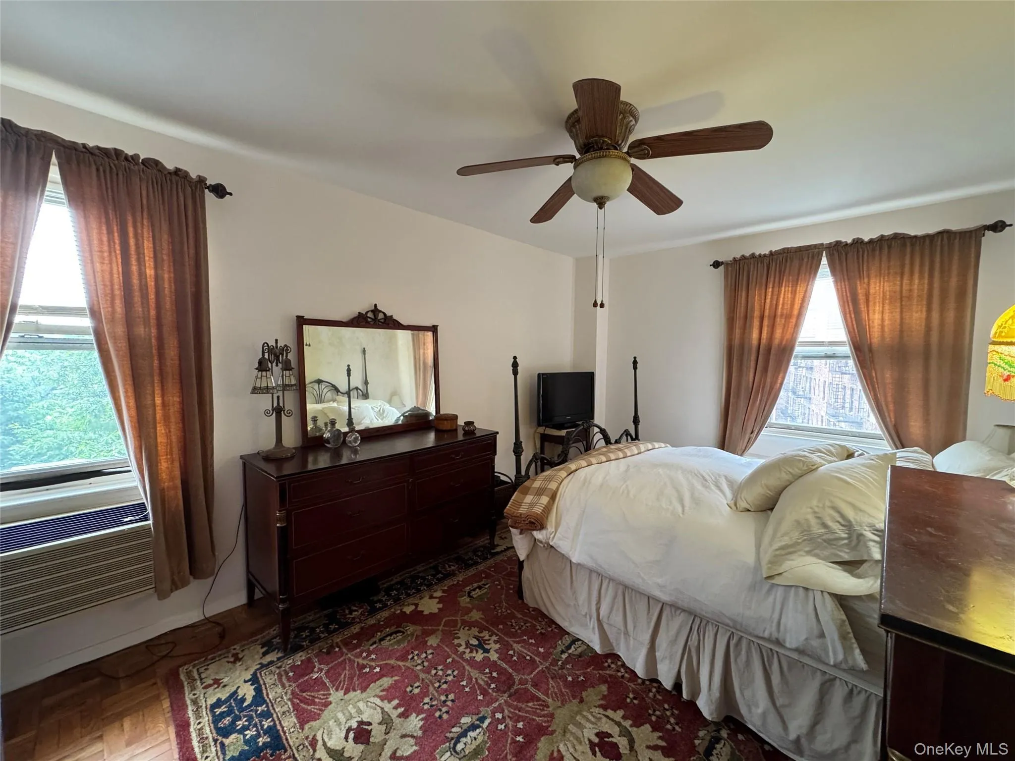 Bedroom featuring a ceiling fan Bedroom featuring a ceiling fan