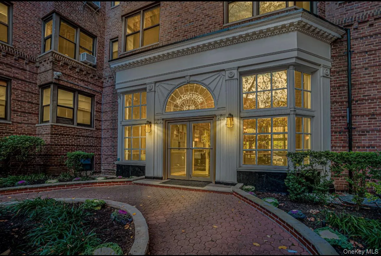 View of exterior entry with brick siding View of exterior entry with brick siding