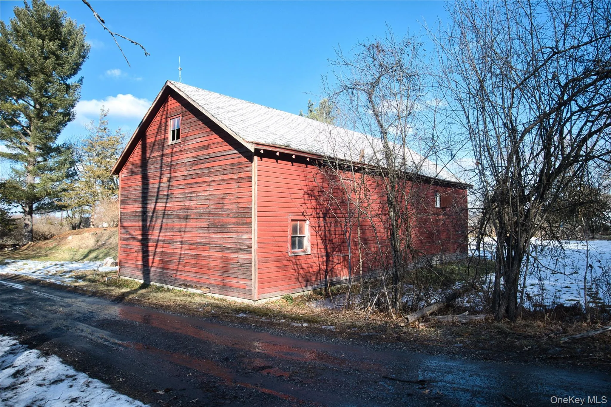 View of home's exterior featuring an outdoor structure View of home's exterior featuring an outdoor structure