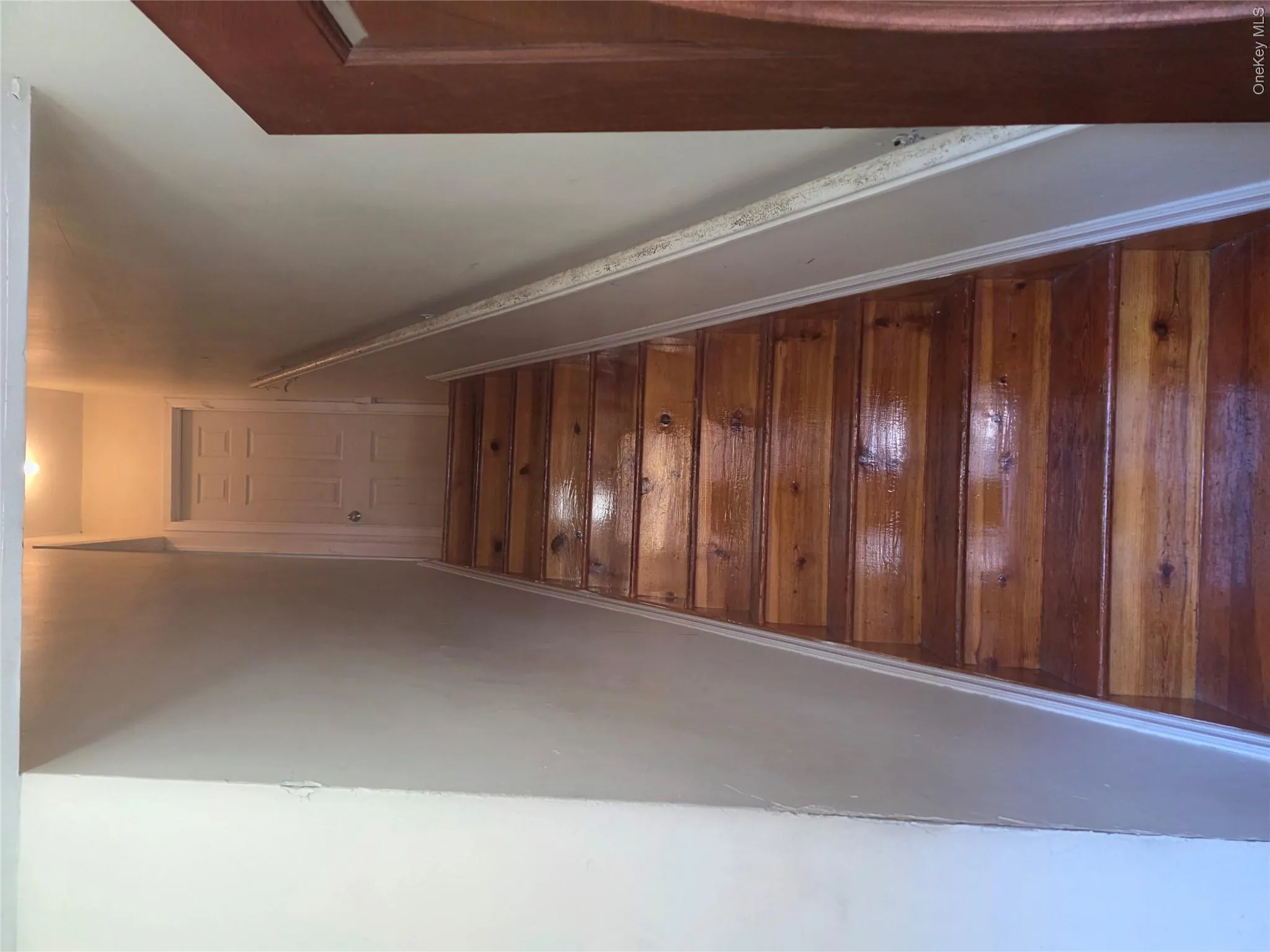 Stairs with hardwood / wood-style flooring and baseboards Stairs with hardwood / wood-style flooring and baseboards