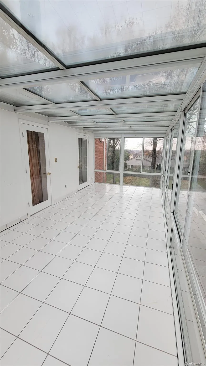 View of unfurnished sunroom View of unfurnished sunroom