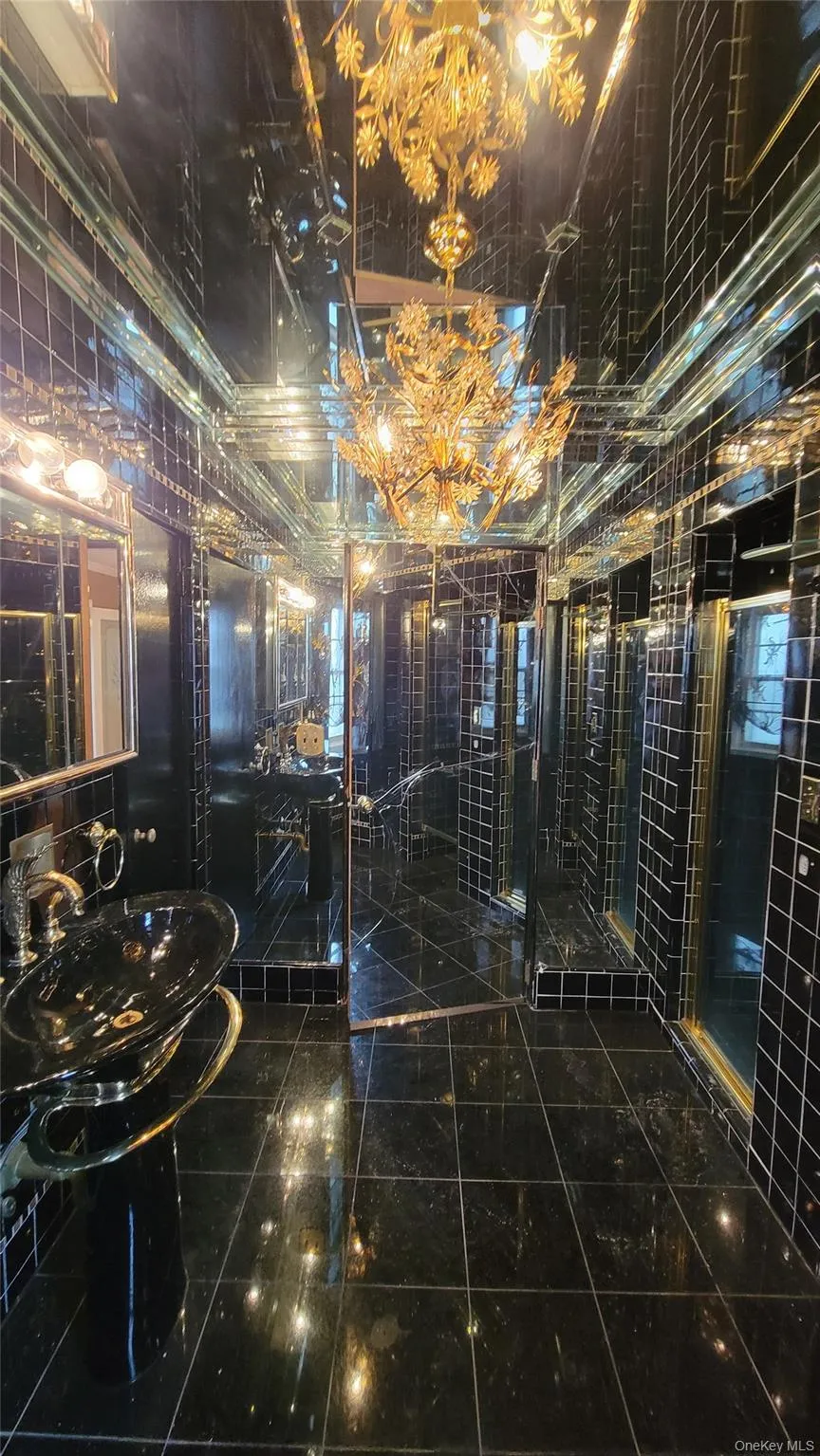 Bathroom featuring vanity Bathroom featuring vanity