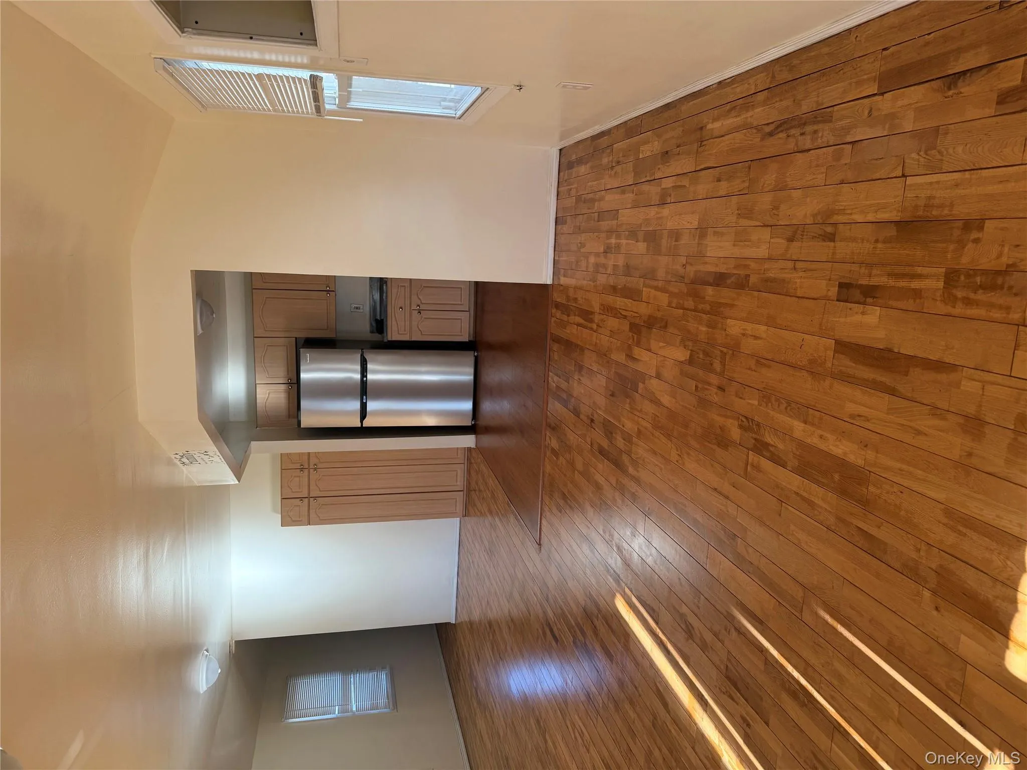 Unfurnished living room featuring dark wood finished floors Unfurnished living room featuring dark wood finished floors