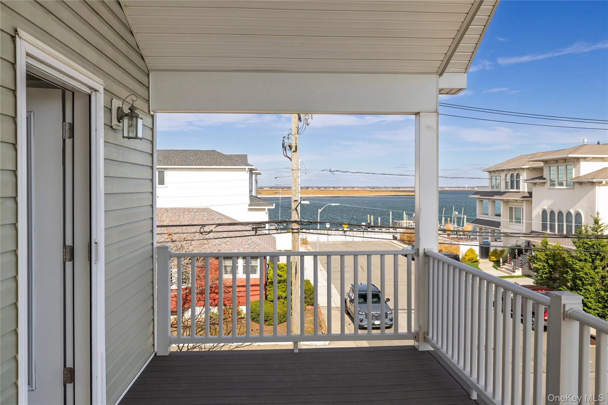 Balcony featuring a water view Balcony featuring a water view