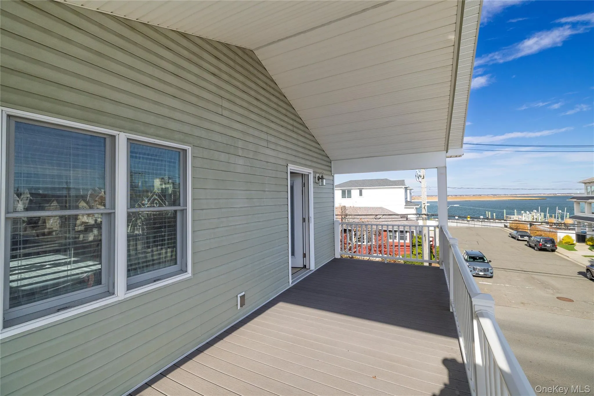 Deck featuring a water view Deck featuring a water view