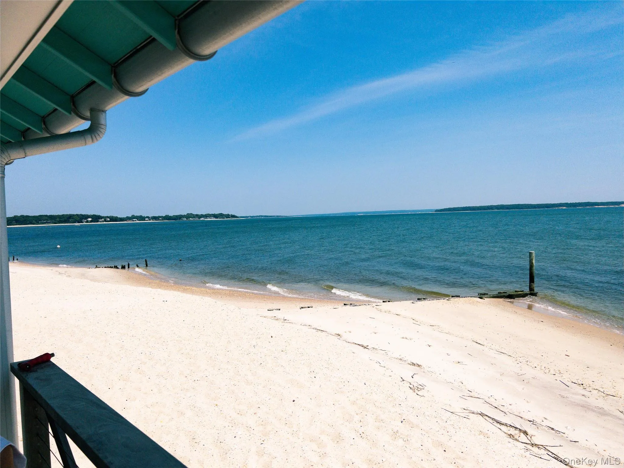 Water view featuring local beach Water view featuring local beach