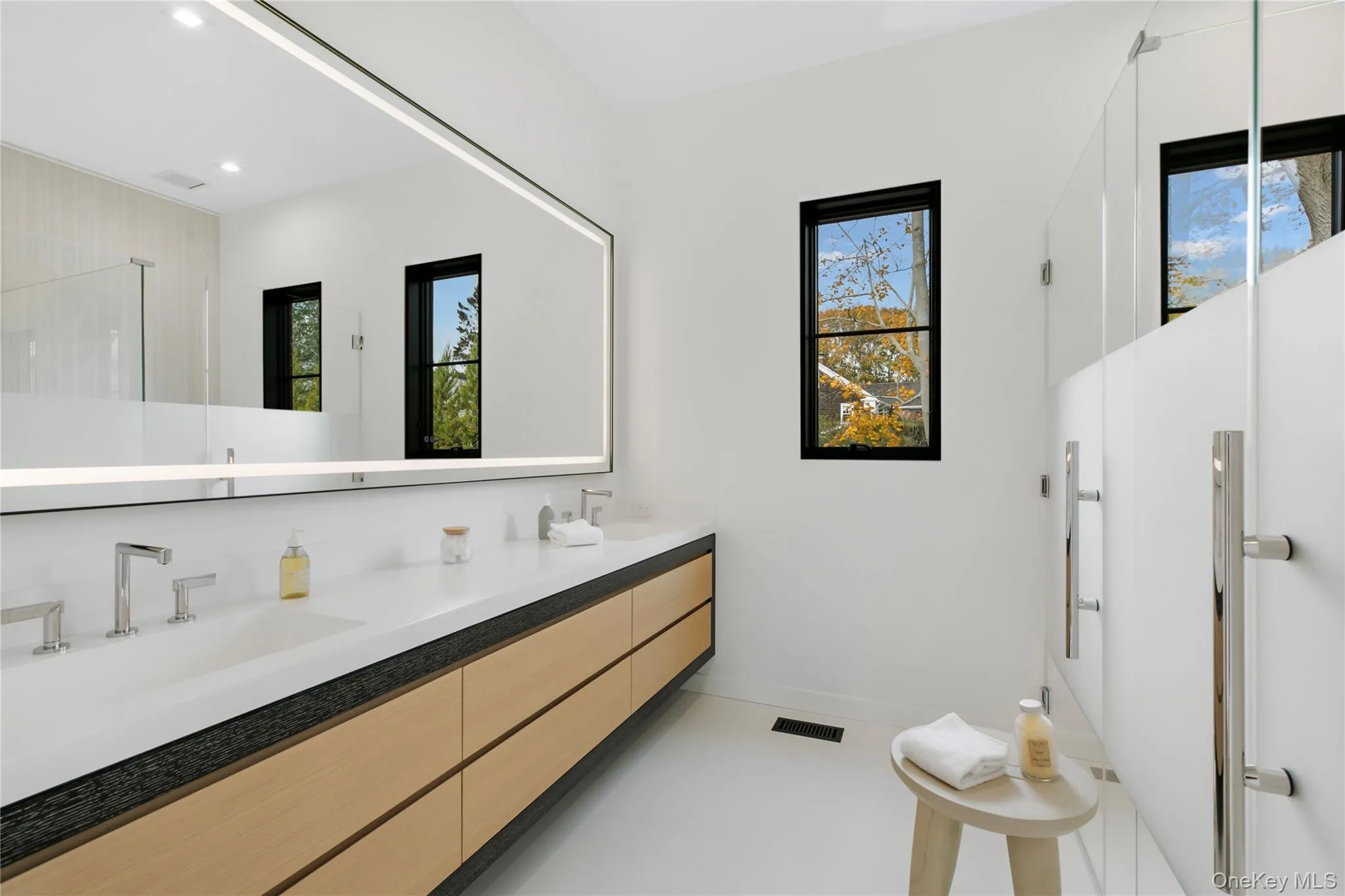 Bathroom featuring double vanity and recessed lighting Bathroom featuring double vanity and recessed lighting