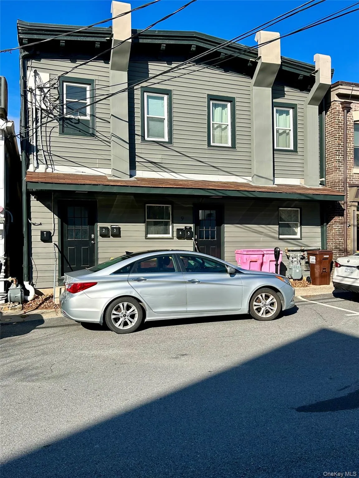 View of front of house with a chimney View of front of house with a chimney