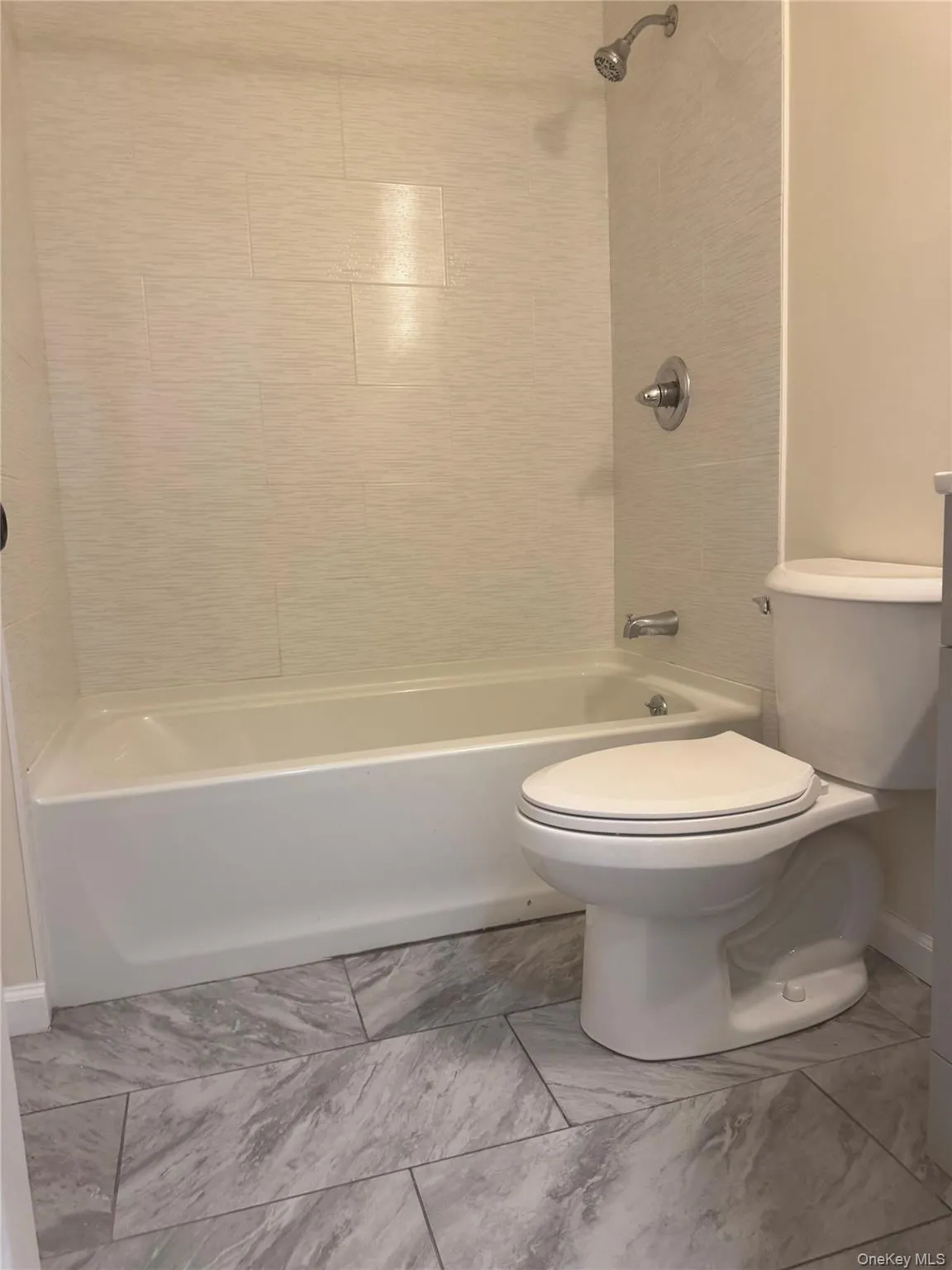 Full bath with toilet and shower combination Full bath with toilet and shower combination