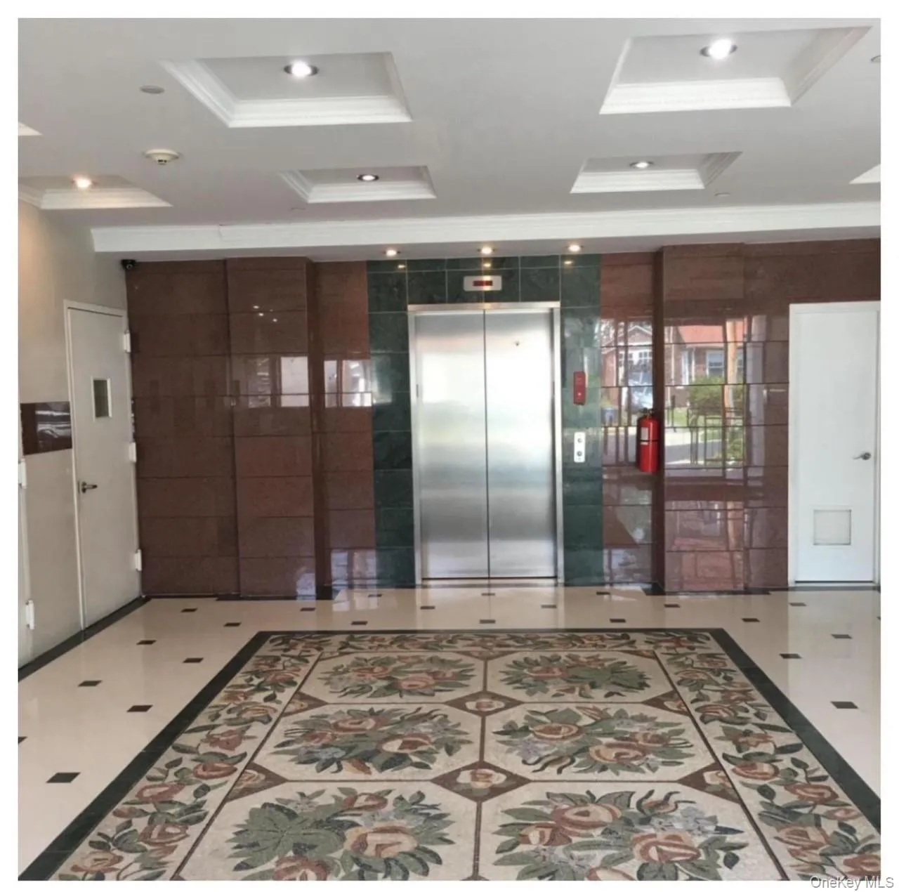 Community lobby with crown molding and recessed lighting Community lobby with crown molding and recessed lighting