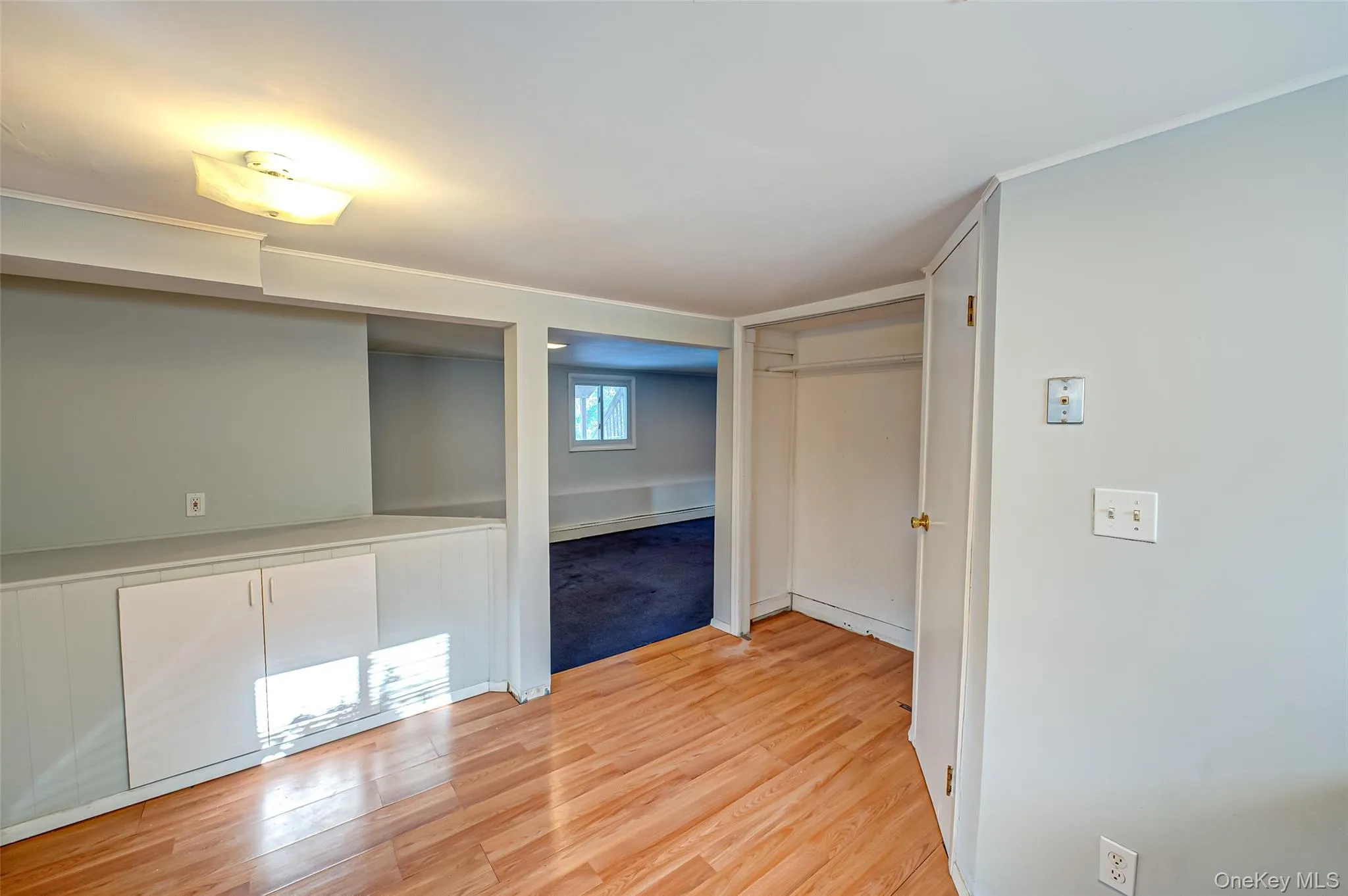 Empty room featuring light wood-type flooring Empty room featuring light wood-type flooring