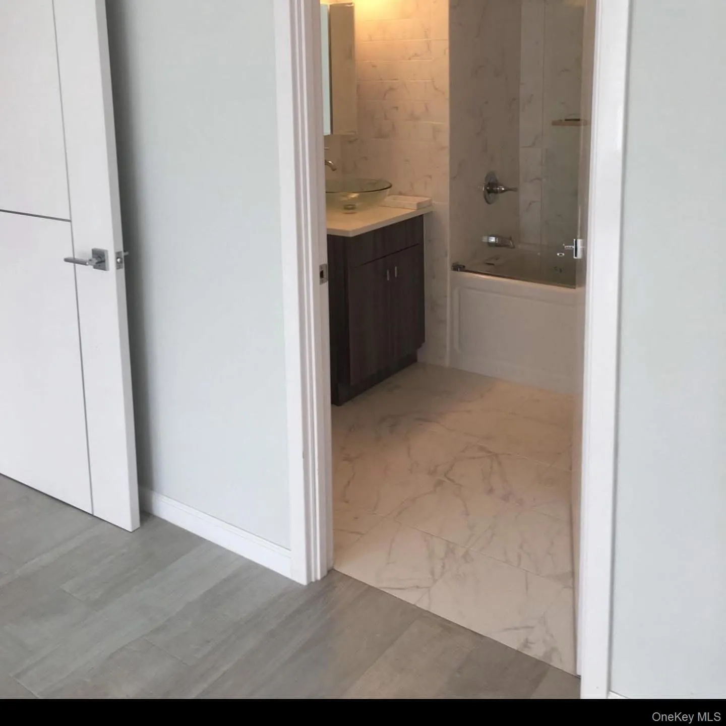 Full bath with vanity and shower / bath combination Full bath with vanity and shower / bath combination