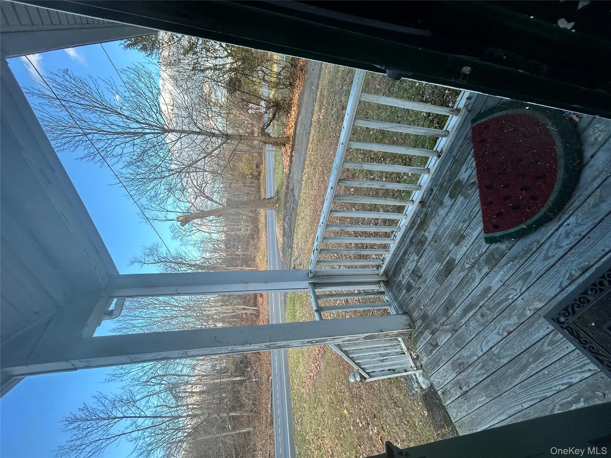 Wooden porch with a yard Wooden porch with a yard