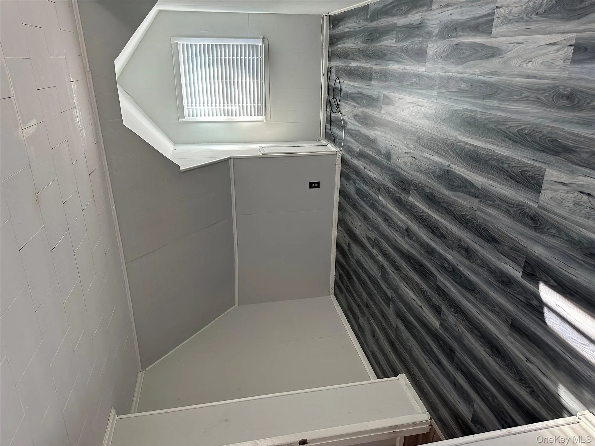 Additional living space with dark wood-type flooring and lofted ceiling Additional living space with dark wood-type flooring and lofted ceiling