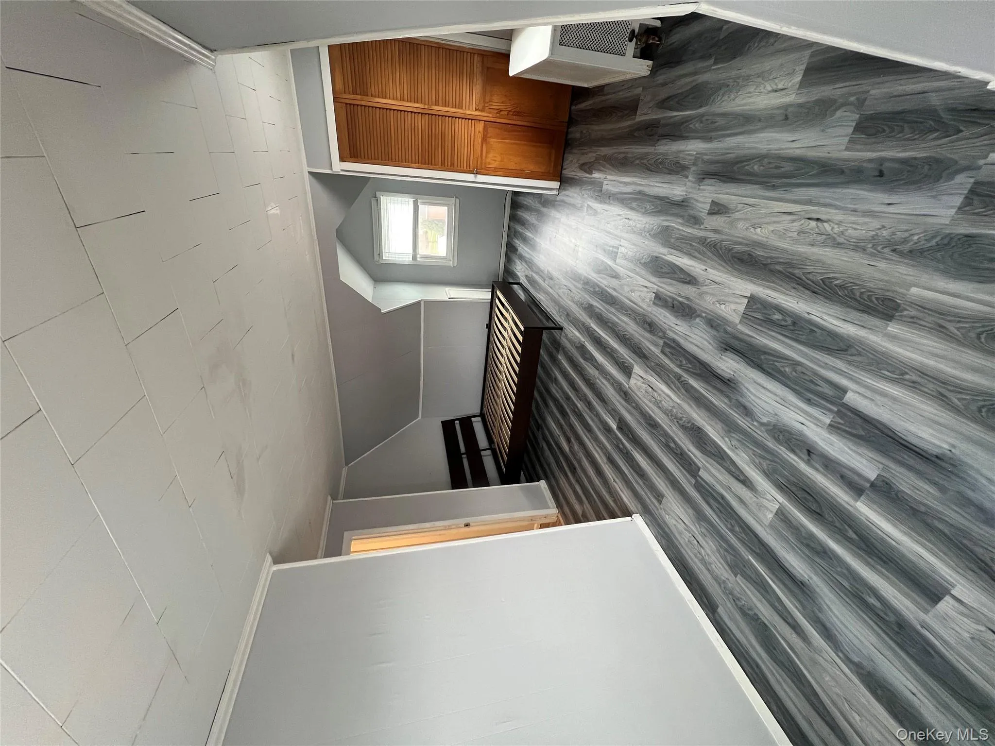 Additional living space featuring dark wood finished floors and lofted ceiling Additional living space featuring dark wood finished floors and lofted ceiling