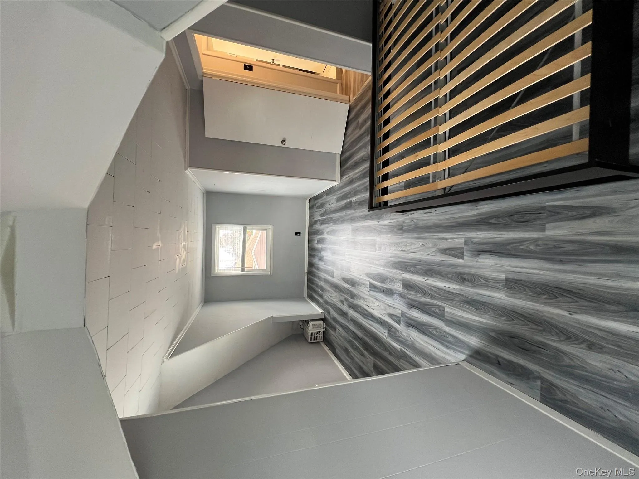 Unfurnished bedroom with dark wood finished floors and crown molding Unfurnished bedroom with dark wood finished floors and crown molding