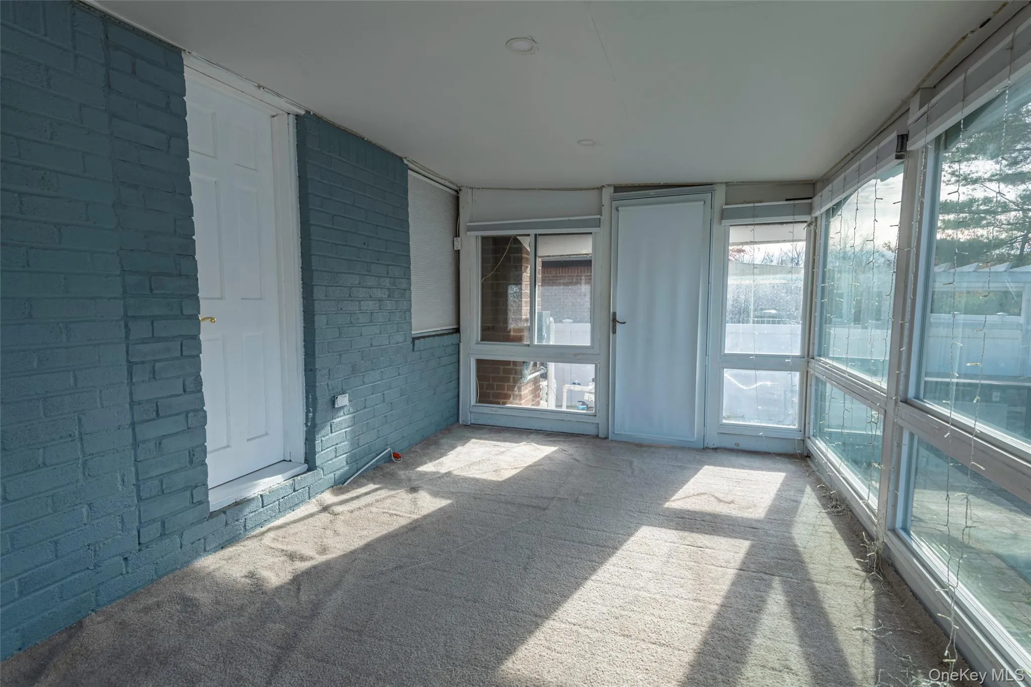 View of unfurnished sunroom View of unfurnished sunroom