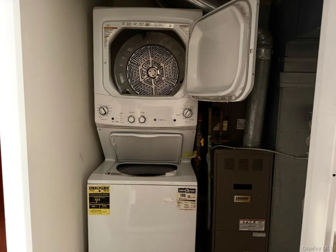 Laundry area with estacked washer and dryer Laundry area with estacked washer and dryer