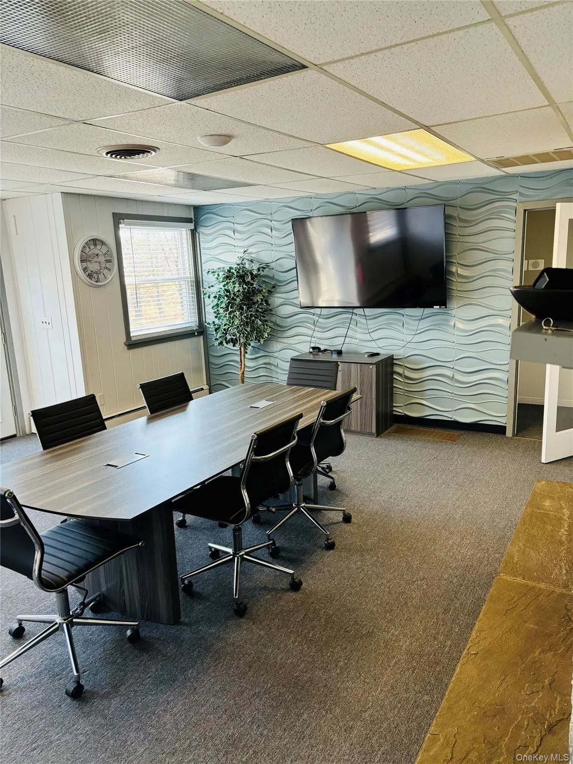 Office space Conference Room featuring a drop ceiling Office space Conference Room featuring a drop ceiling