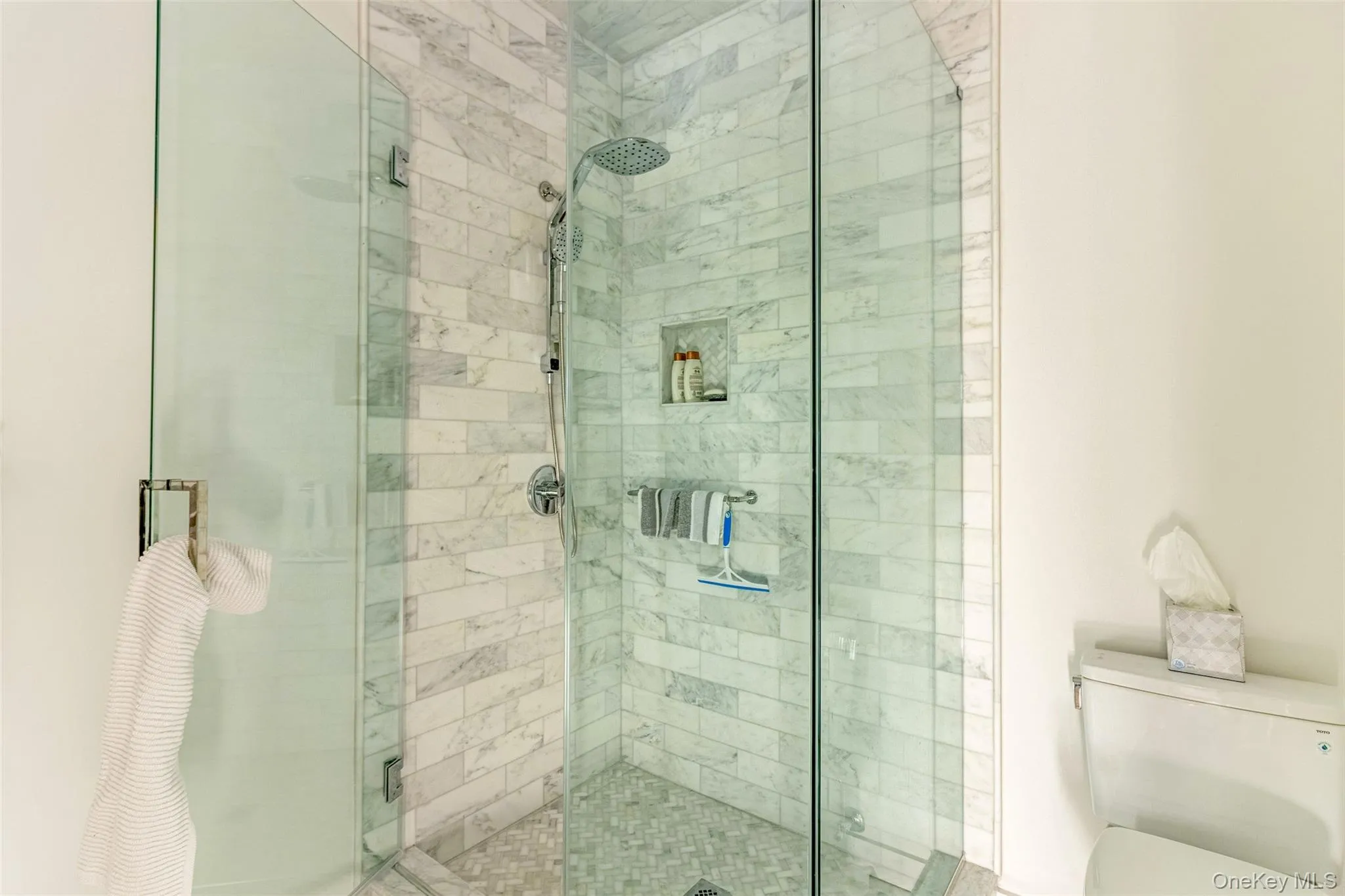 Full bath with a shower stall Full bath with a shower stall