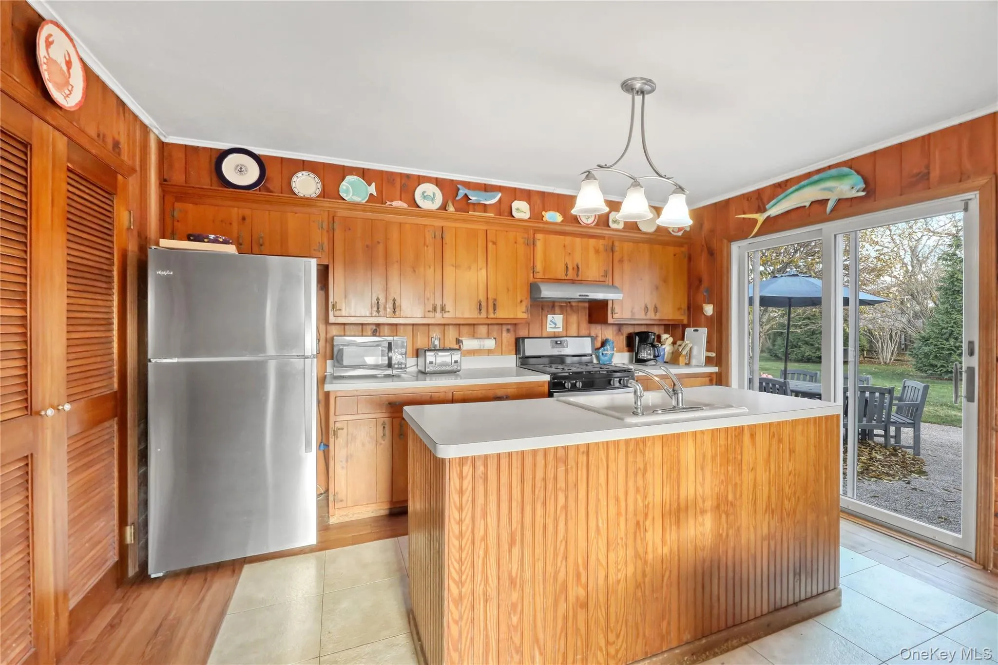 Kitchen with Island and Glass Sliders Kitchen with Island and Glass Sliders