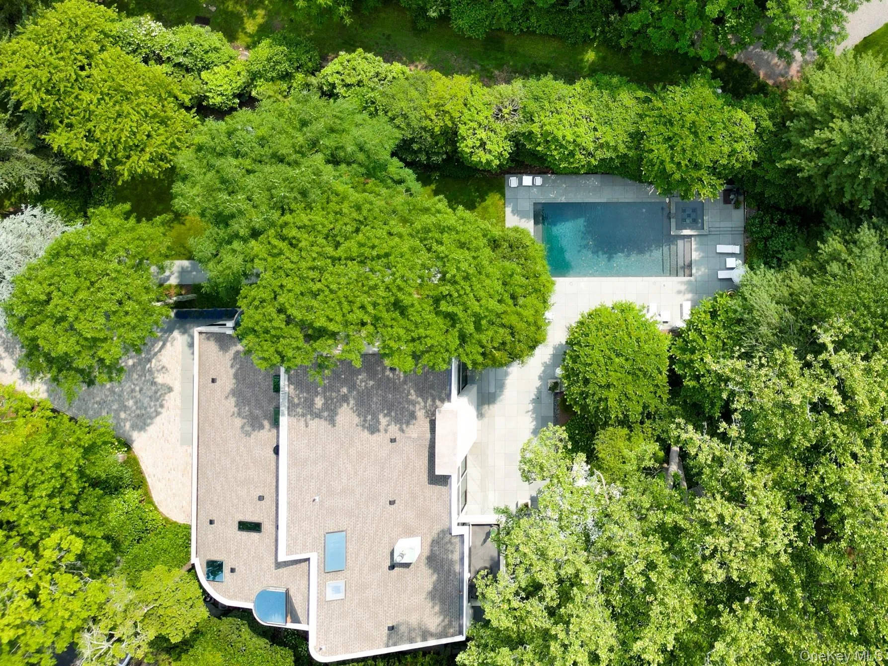 View of subject property featuring a pool area View of subject property featuring a pool area