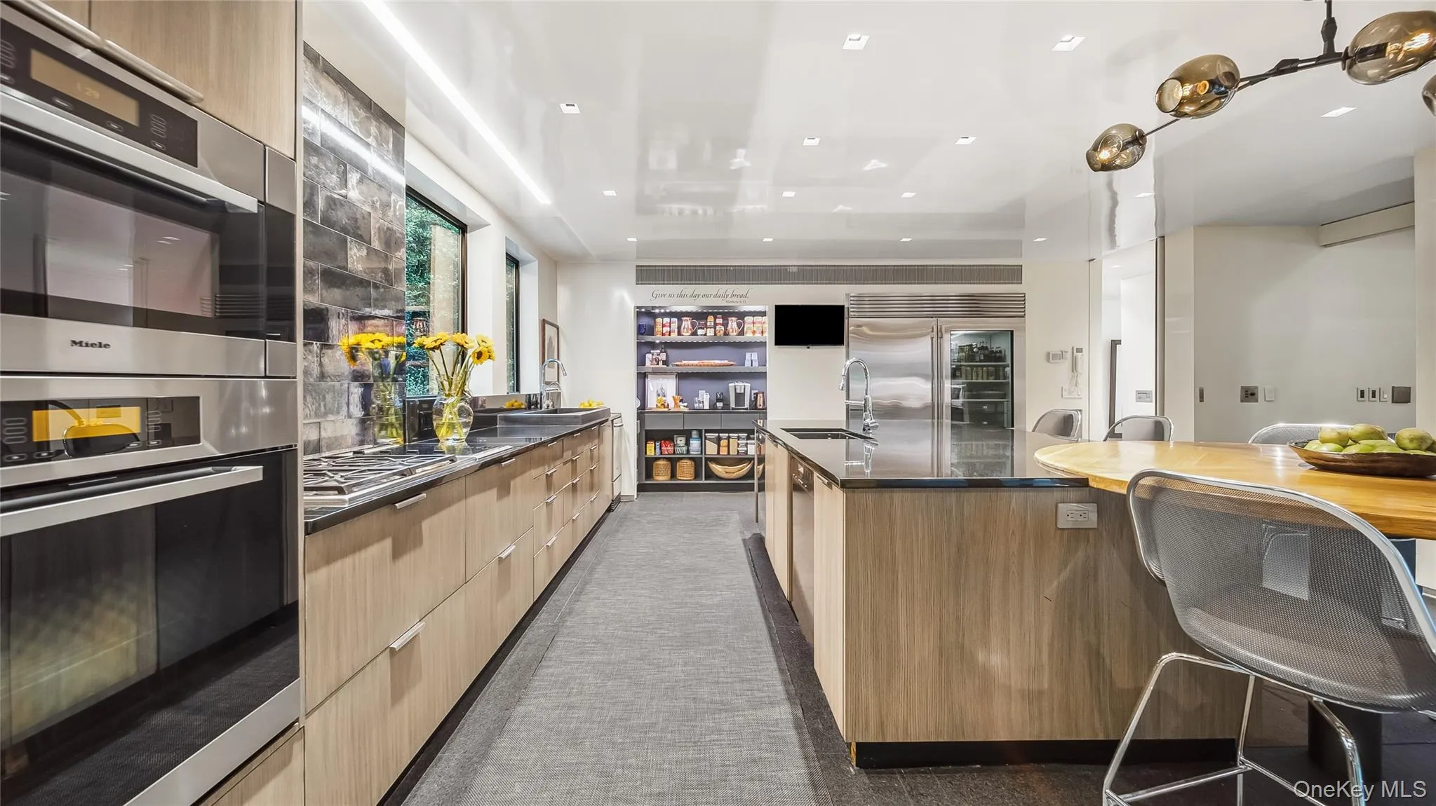 Custom Stained Rift European Oak Cabinetry, Stainless Steel Miele, Wolf, and Sub-Zero Appliances Custom Stained Rift European Oak Cabinetry, Stainless Steel Miele, Wolf, and Sub-Zero Appliances