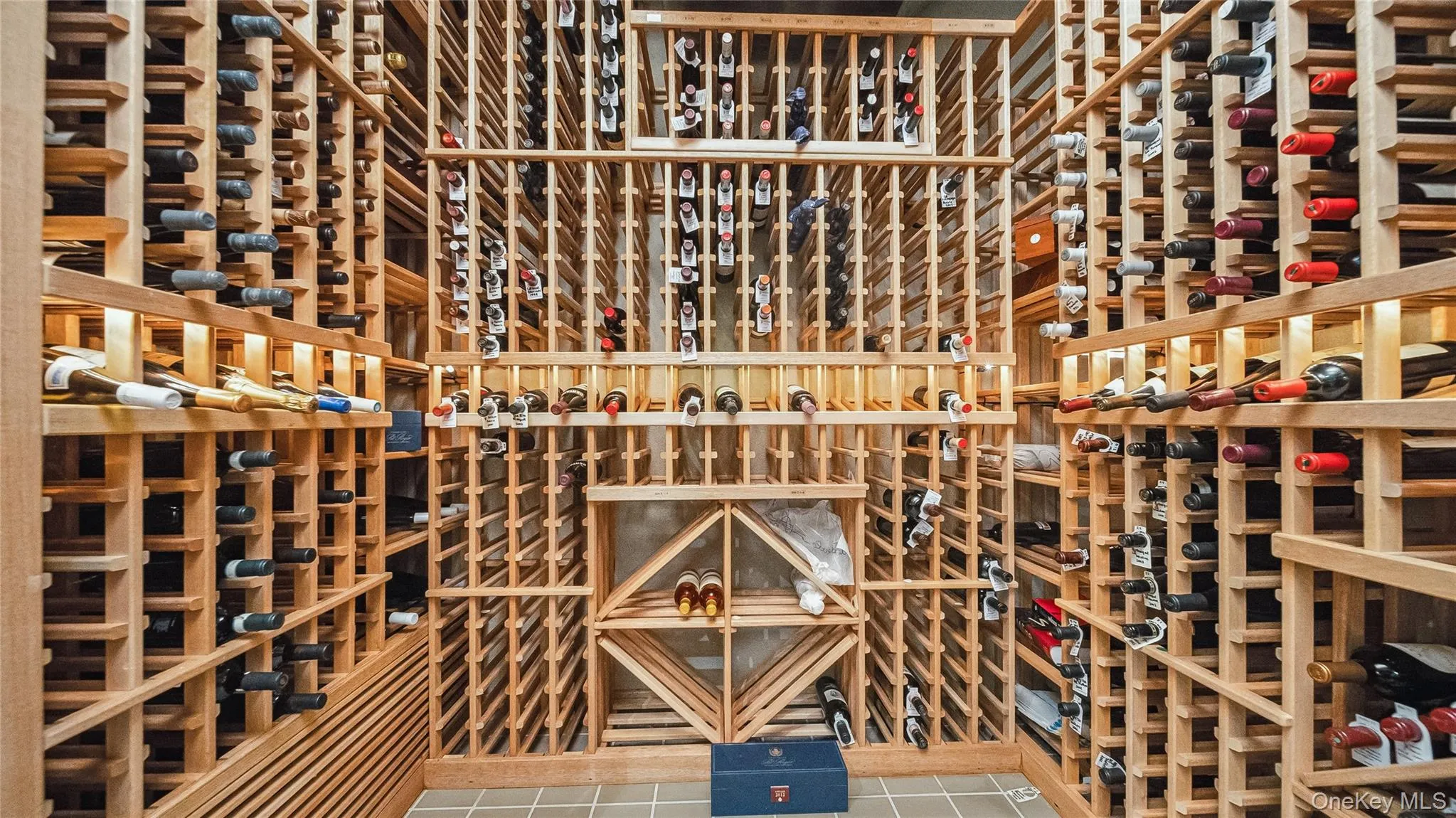 Wine room with tile patterned flooring Wine room with tile patterned flooring