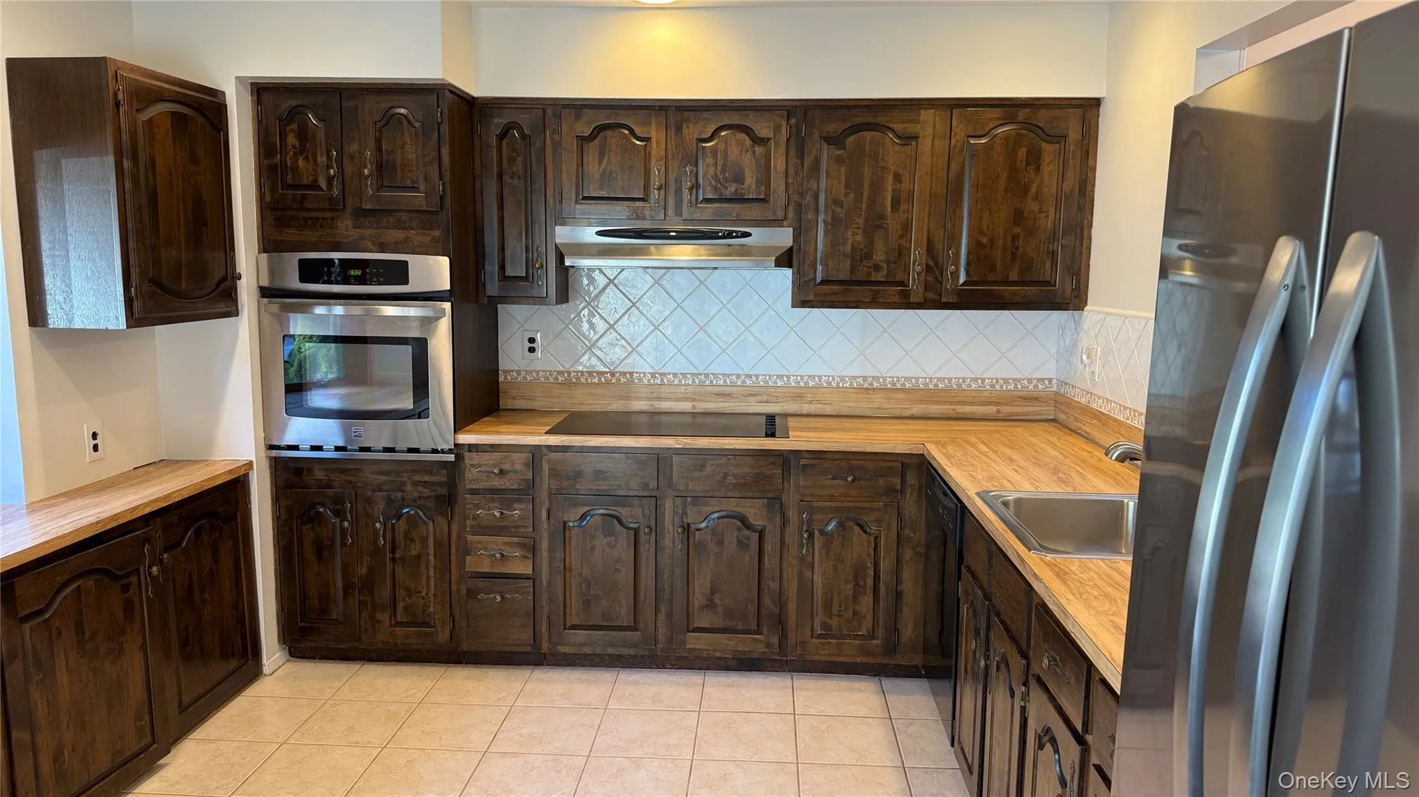 Kitchen with lots of counter and cabinets Kitchen with lots of counter and cabinets